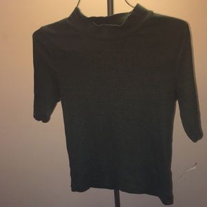 Green turtle neck top